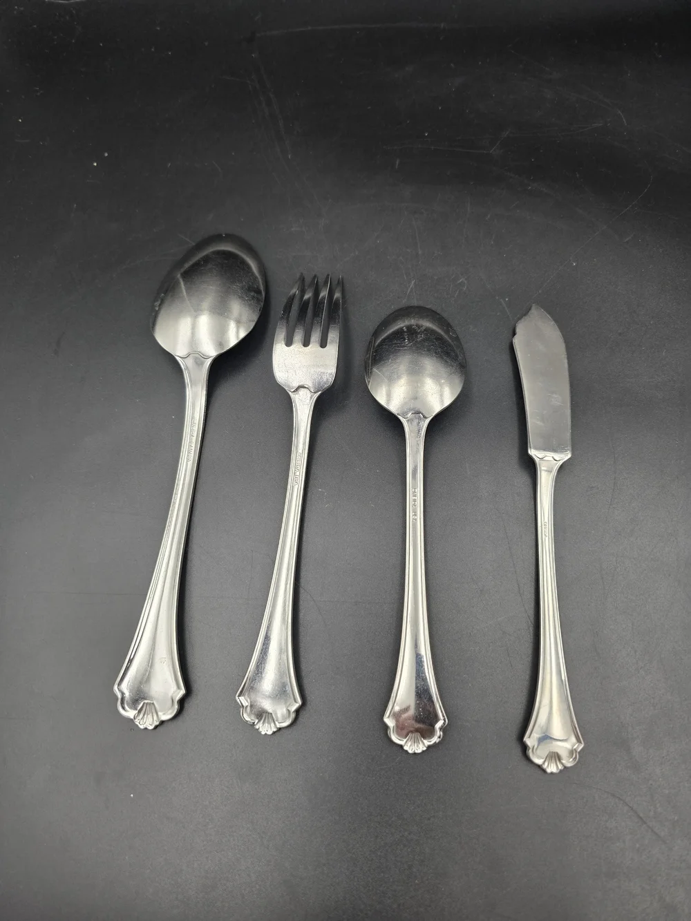 Oneida Silver Ornate Handle Flatware Set - 4 Piece